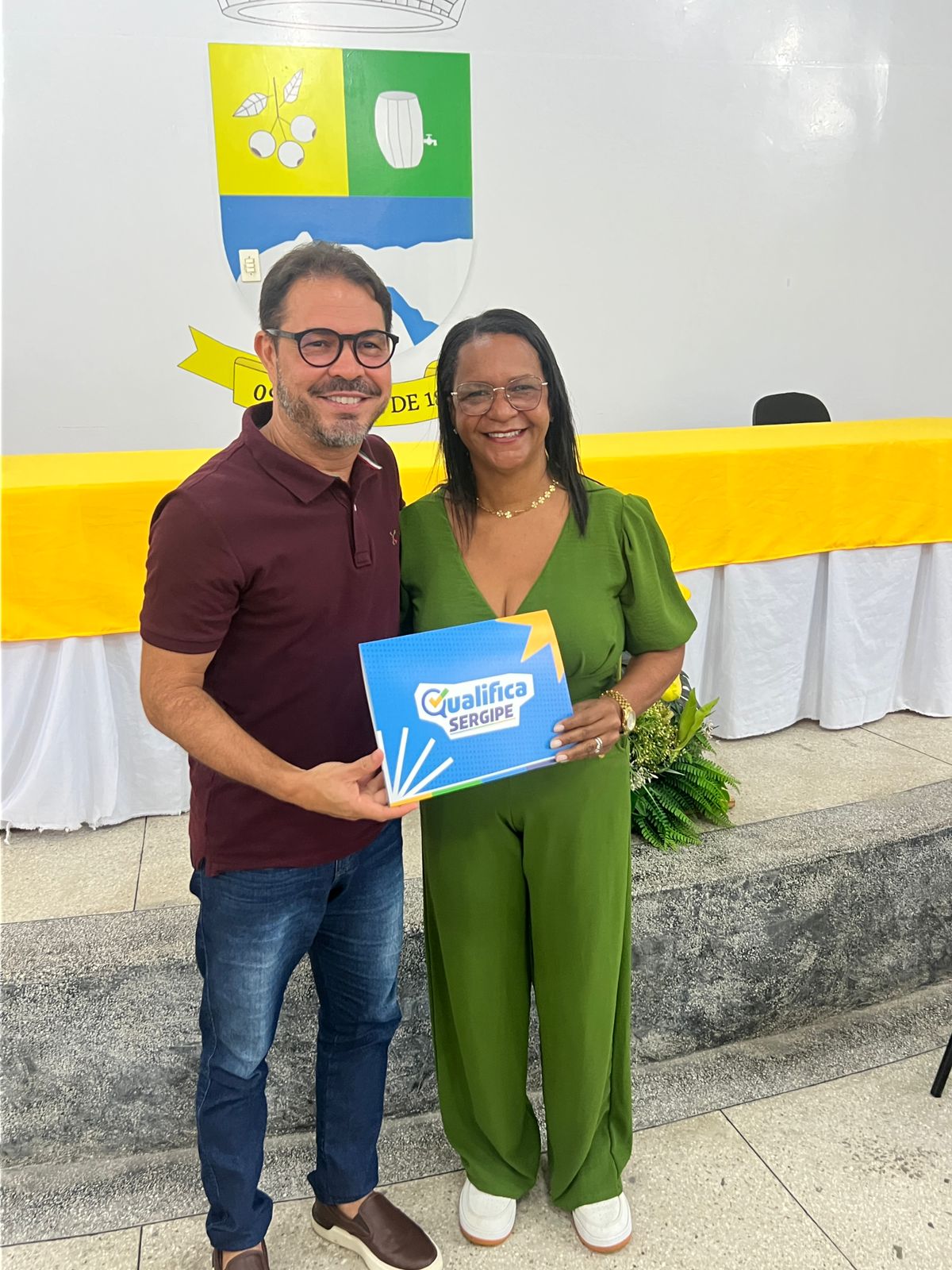 Foto da notícia Entrega dos certificados dos cursos de corte e costura de moda fitness e de roupas e acessórios para bebês.